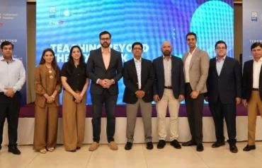 DWP Technologies and GNEXT representatives at the Teaching Beyond the Textbook event in Lahore, promoting digital learning, Apple technology and modern education solutions in Pakistan.